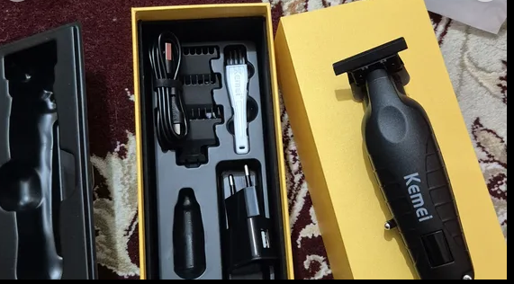 ماشین اصلاح موی سر و صورت کیمی مدل KM-2293 با تیغه کربن استیل خودتیز شونده
