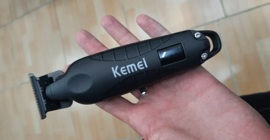 ماشین اصلاح موی سر و صورت کیمی مدل KM-2293 با تیغه کربن استیل خودتیز شونده